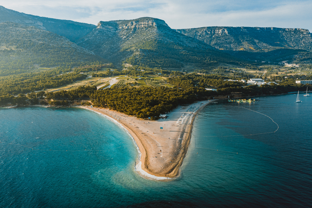 Golden Horn Beach reaching into clear blue water near Bol on Brač